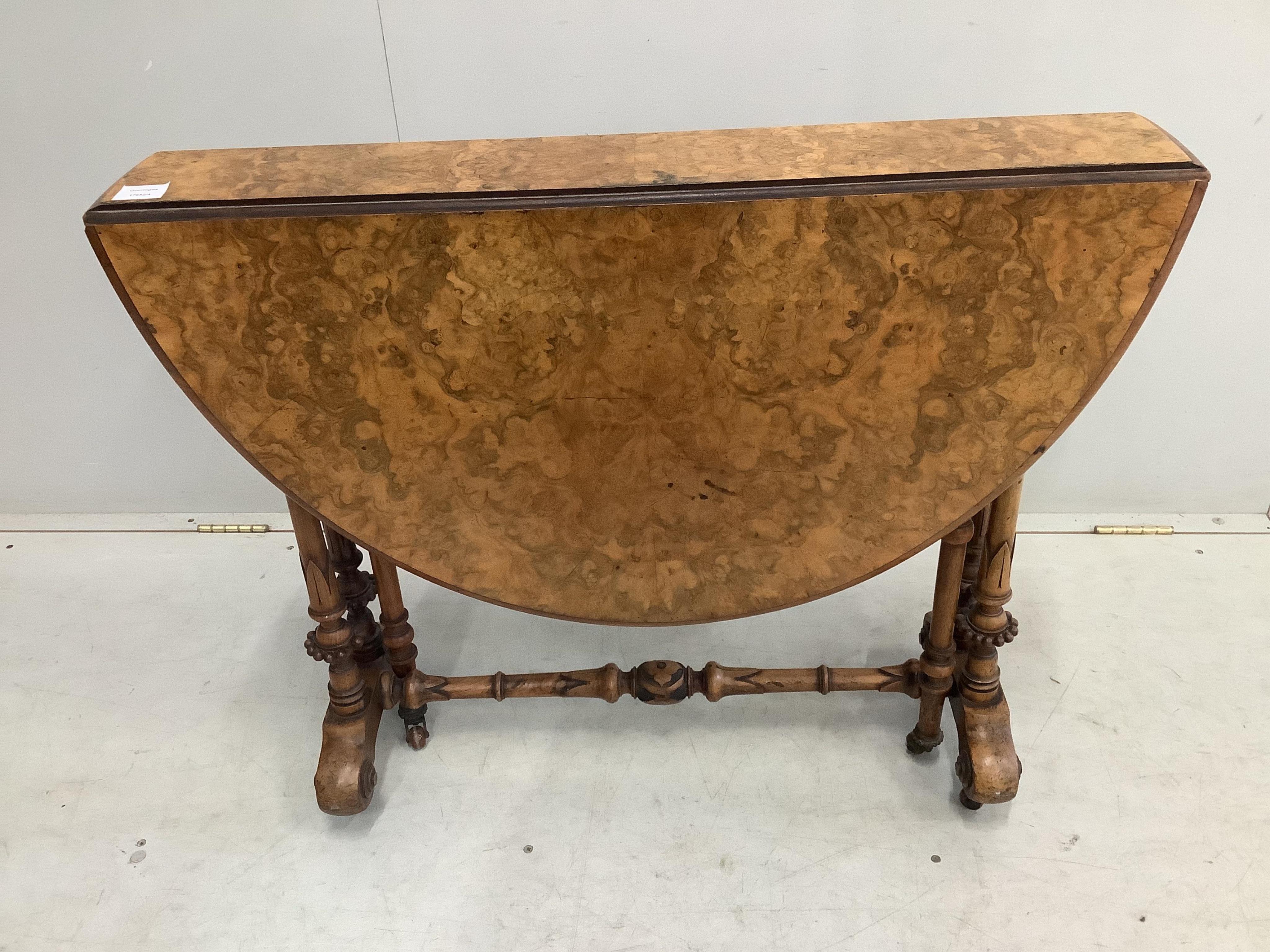 A Victorian burr walnut Sutherland table, width 90cm, height 71cm. Condition - fair